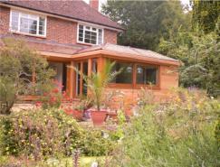 Timber frame extension, with cedar shingle roof