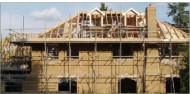 Attic trusses, crown roof, dormers, with traditional hand cut roof over garage.  Oxshott, Surrey