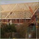 Gable ended house with traditional hand cut roof, incorporating veluxes. Effingham, Surrey